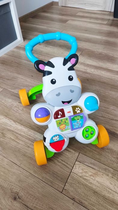 Interaktywny pchacz Zebra Fisher-Price wersja niemiecka chodzik