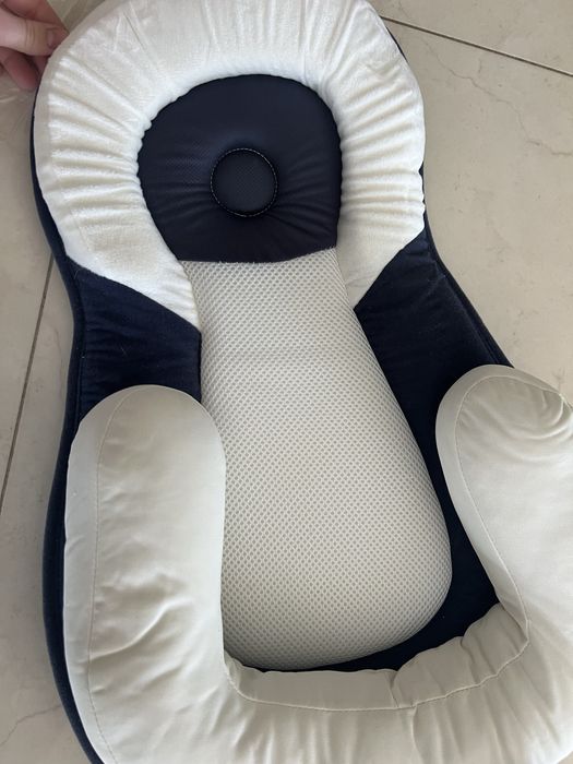 Позиціонер для сну новонародженого.