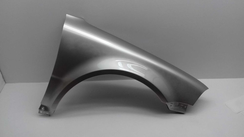 Błotnik lewy VW PASSAT B5 LIFT bez otworu na kierunek WSZYSTKIE kolory