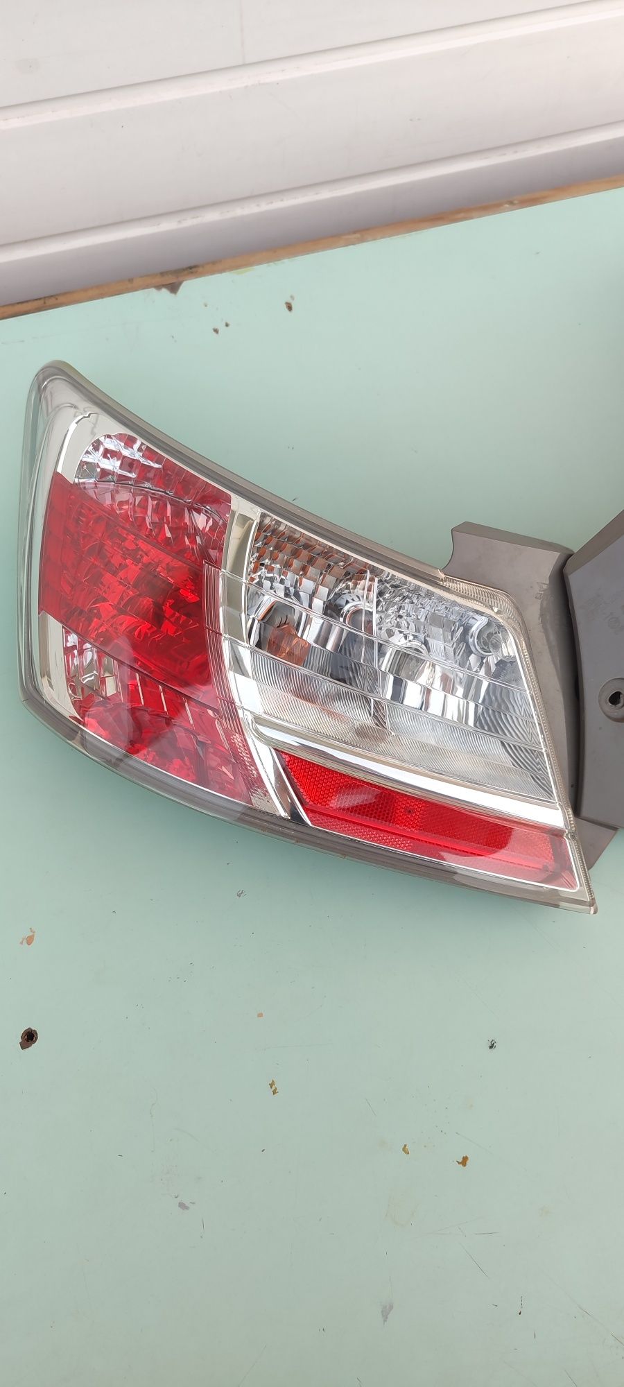 Фонарь Daihatsu Materia