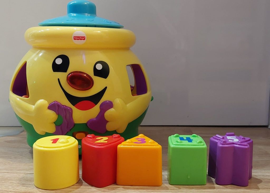 Fisher Price garnuszek na klocuszek