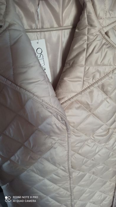 Жіноче стьобане пальто курточка з поясом