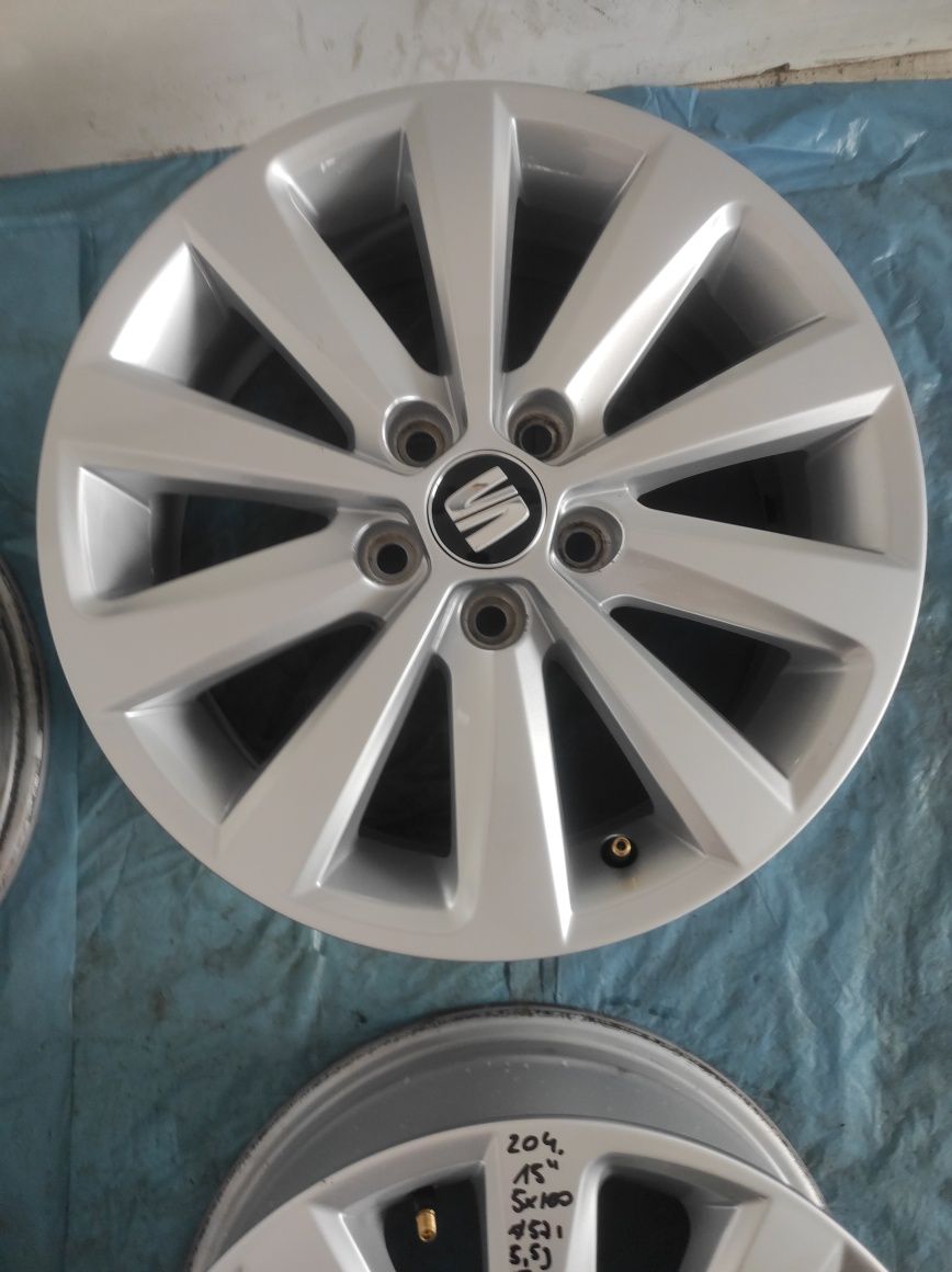 204 Felgi aluminiowe ORYGINAŁ SKODA R 15 5x100 otwór 57,1 Bardzo Ładne