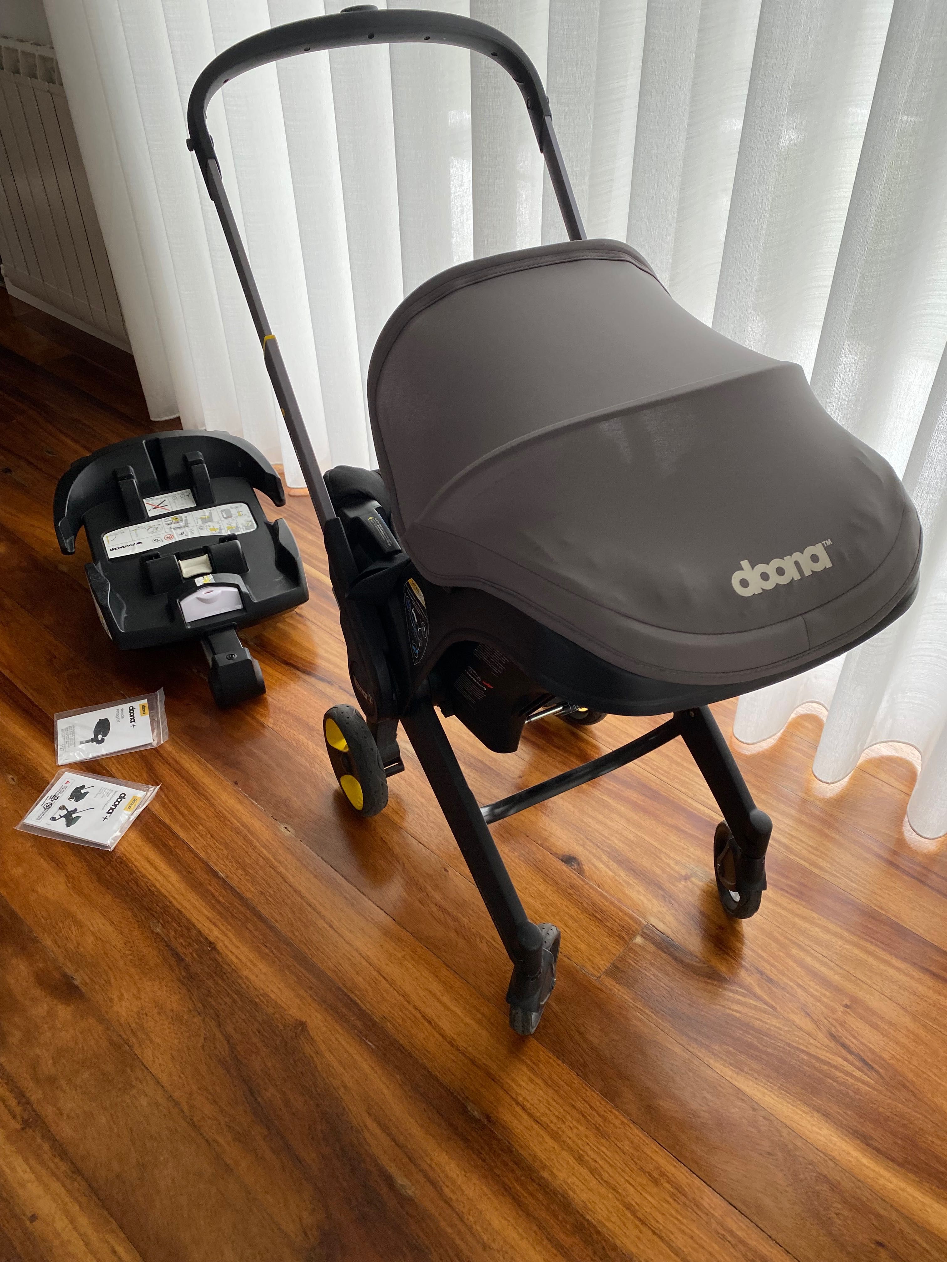 Carrinho, cadeira auto marca doona