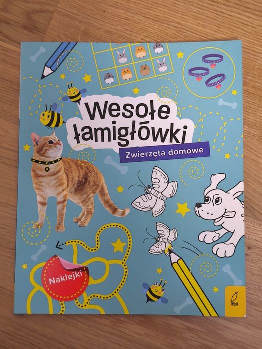 Książka dla dzieci "Wesołe łamigłówki. Zwierzęta domowe",stan jak nowa