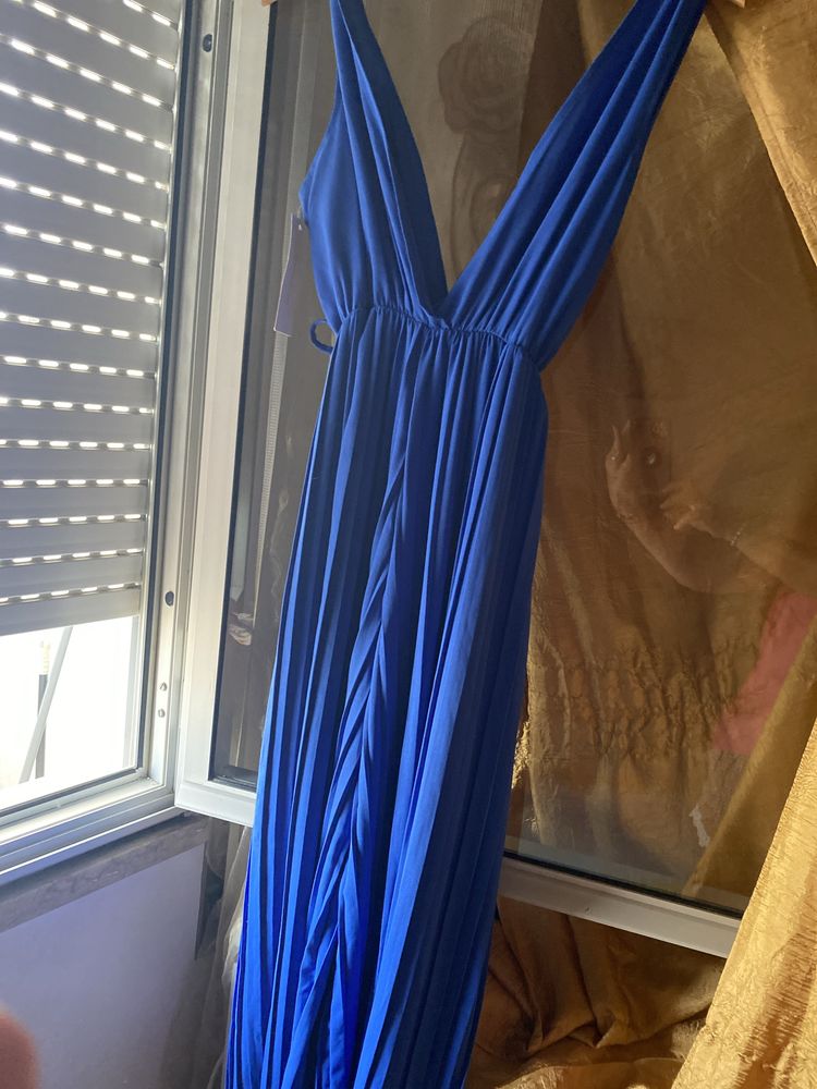 Vendo  macacao novo  com  ediqueda nunca useio tamanho l ou xl muito g