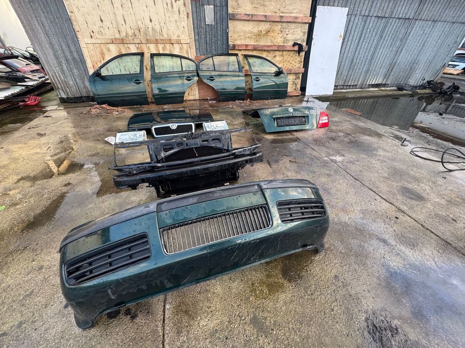 Skoda Octawia octavia 1 zielone kolor zielony drzwi 9570 zderzak przód przedni pas przedni benzyna lampy przednie maska klapa bagażnika klapa tył lampy tylnie tył drzwi prawe lewe przednie tylne