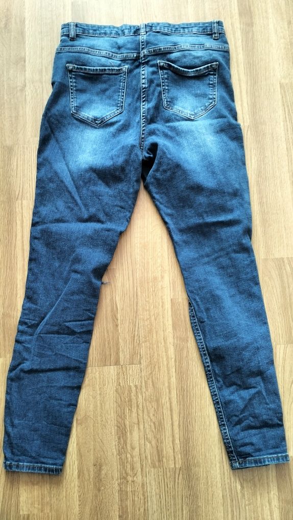 Spodnie denim z przetarciami dżinsowe spodnie