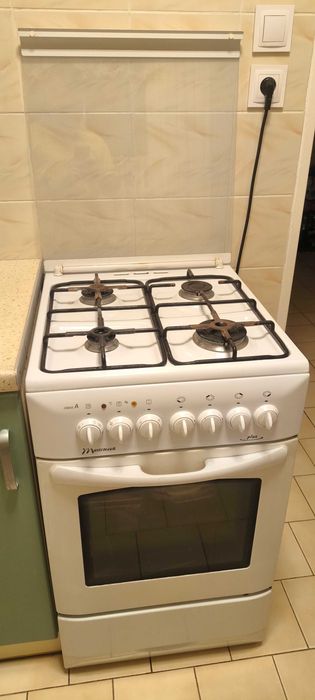 Sprzedam kuchenkę gazową z piekarnikiem elektrycznym
