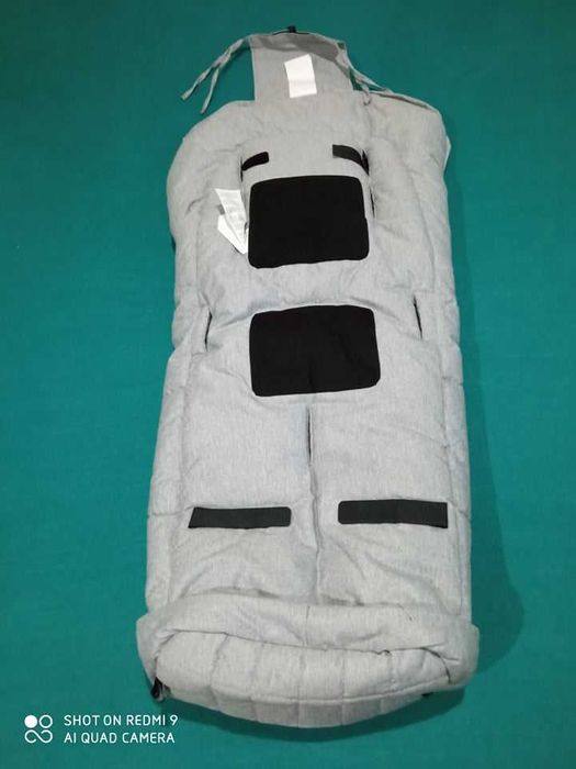 Kaiser śpiworek na nogi "Sheepy", kolor czarny wełna skora jagniecia