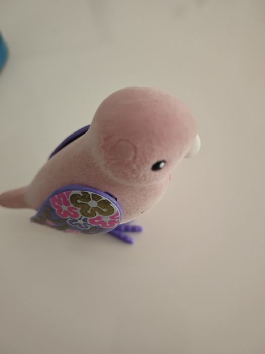 Brinquedo pássaro com gaiola