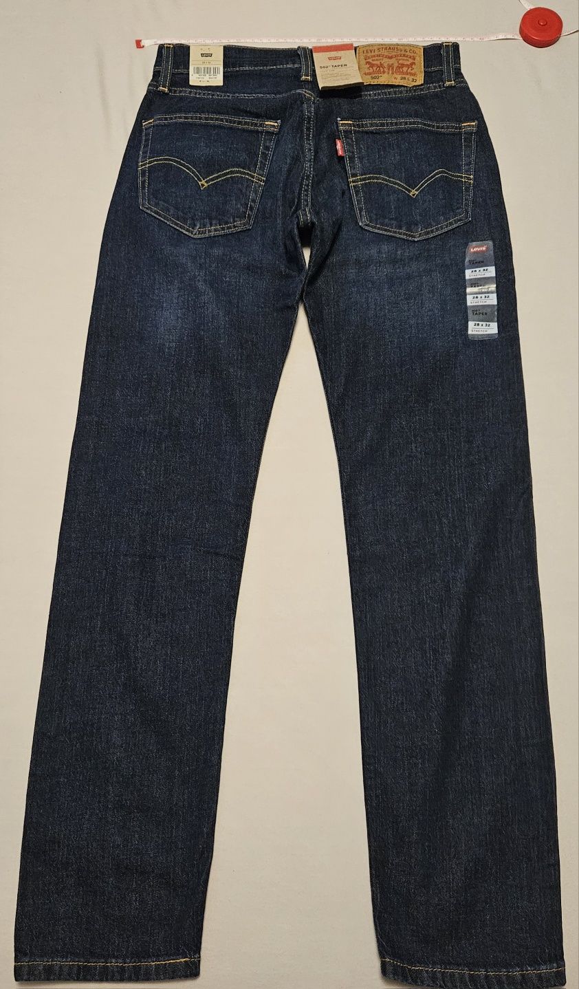 Spodnie Levi's W28 L32 Taper