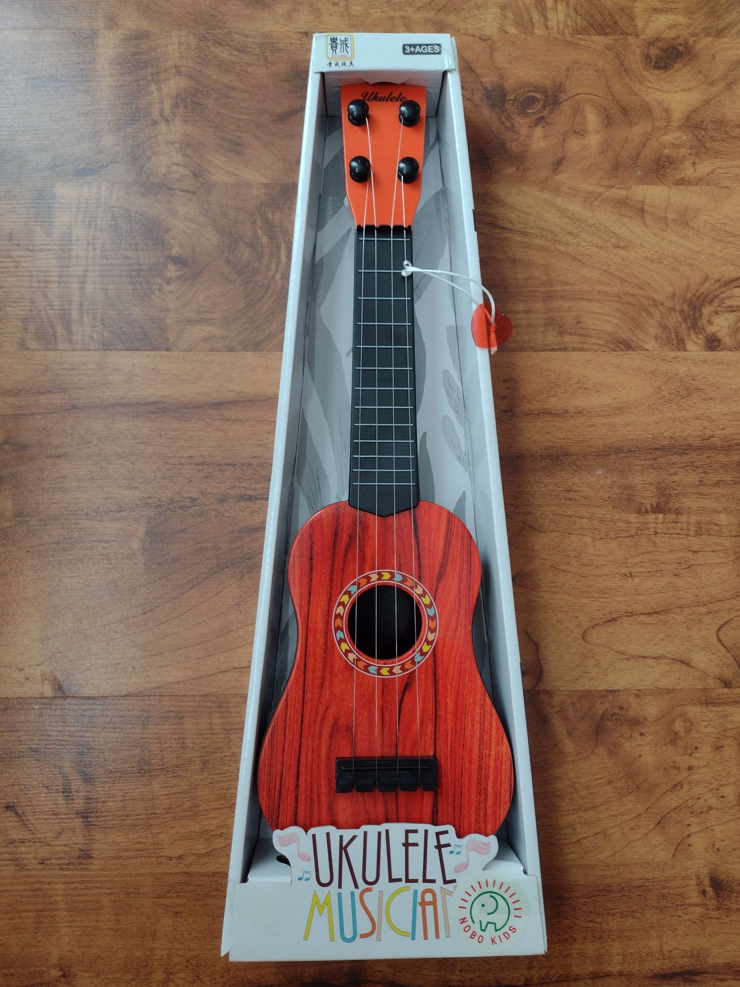 Nowa mała gitara/ukulele dla dzieci 3+