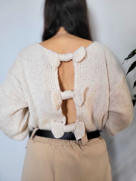 Nowy beżowy sweter damski z kokardkami z tyłu ciepły z domieszką wełny