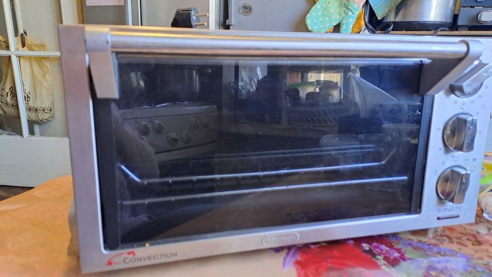 Електро Піч DeLonghi