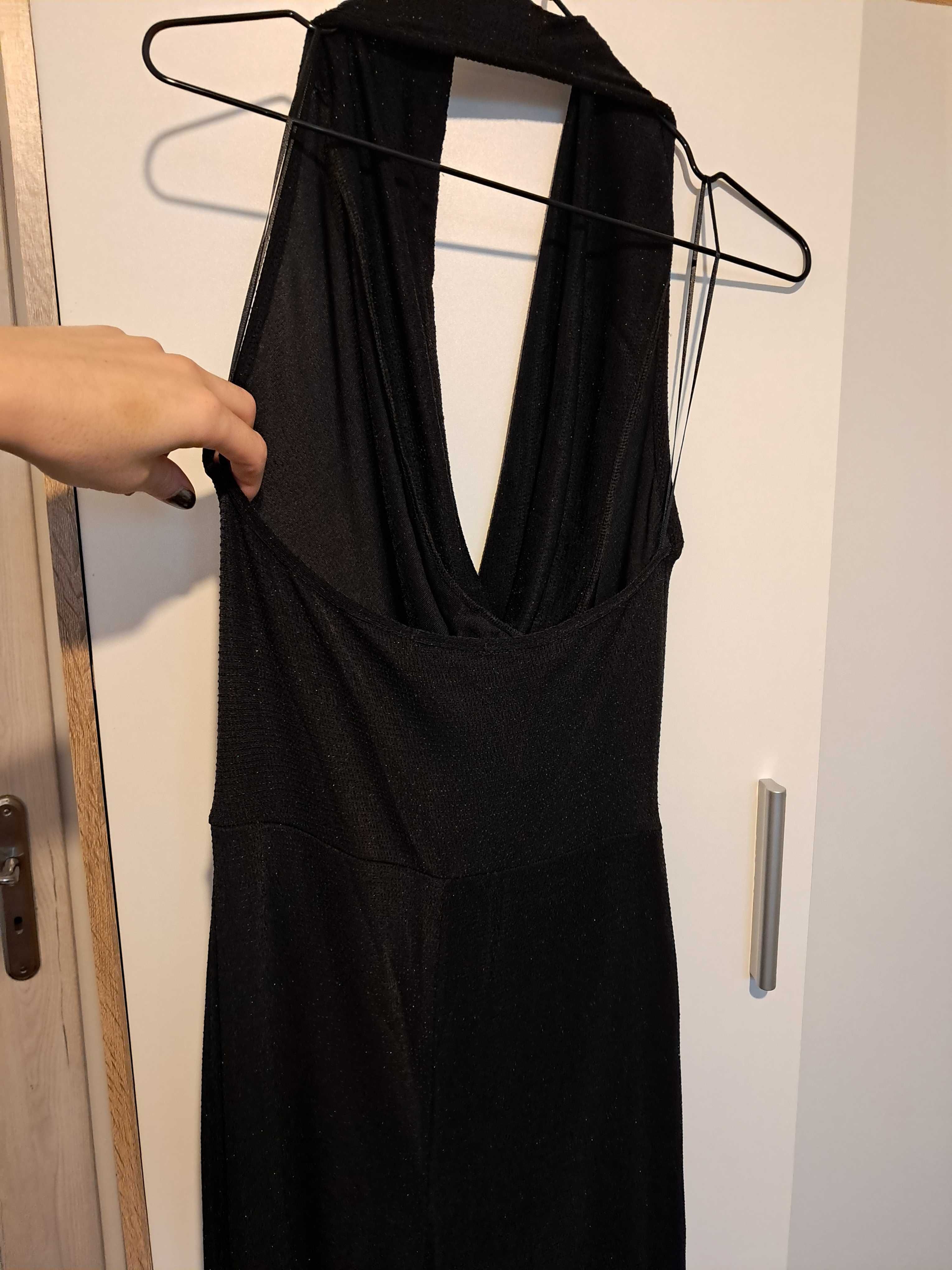 Kombinezon damski czarny z błyszczącą nitką Gina Tricot rozm. M/L