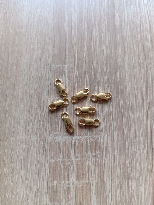 Zapięcie z kółkiem typu fasolka srebro złocone 11mm - 7 szt.