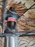 Uszkodzone koło rowerowe tylne piasta Novatec D792SB-CL