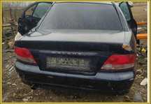 Заднє скло на  Mitsubishi Galant 8.