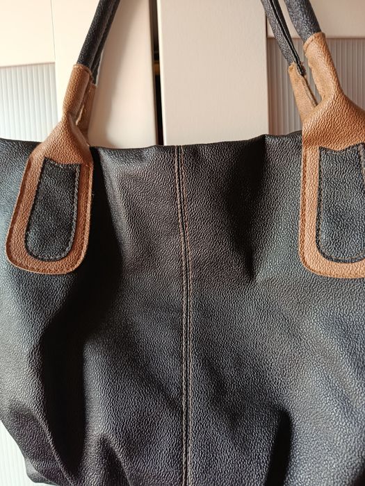 Mala preta e castanha.