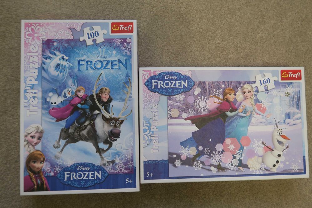 Puzzle Kraina Lodu zestaw 100+160 el. + gratis!