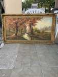 Quadro com moldura dourada