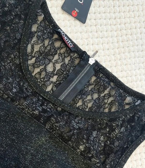 Nowa przepiękna dopasowana sukienka damska bez rękawów mieniąca sie