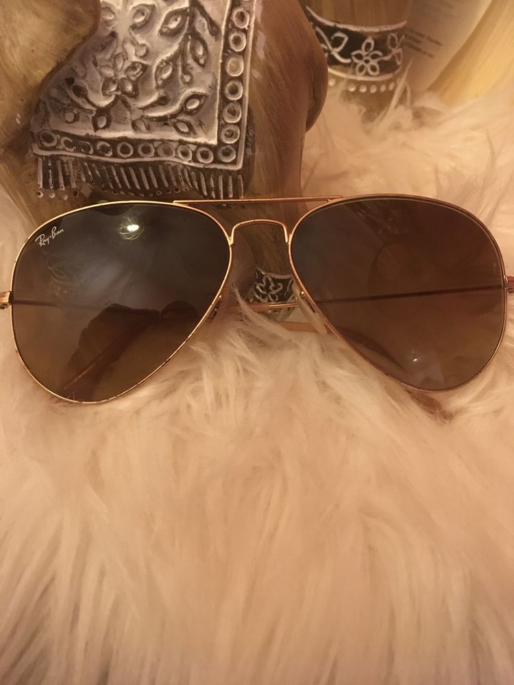 Óculos RayBan dourados
