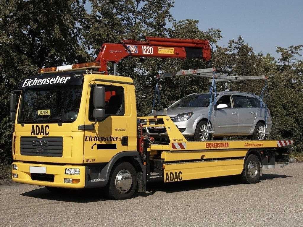 Эвакуатор с манипулятором Киев. Перевозка авто, техники. Евакуатор