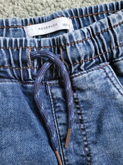 Spodnie typu jogger r. 122 reserved stan idealny