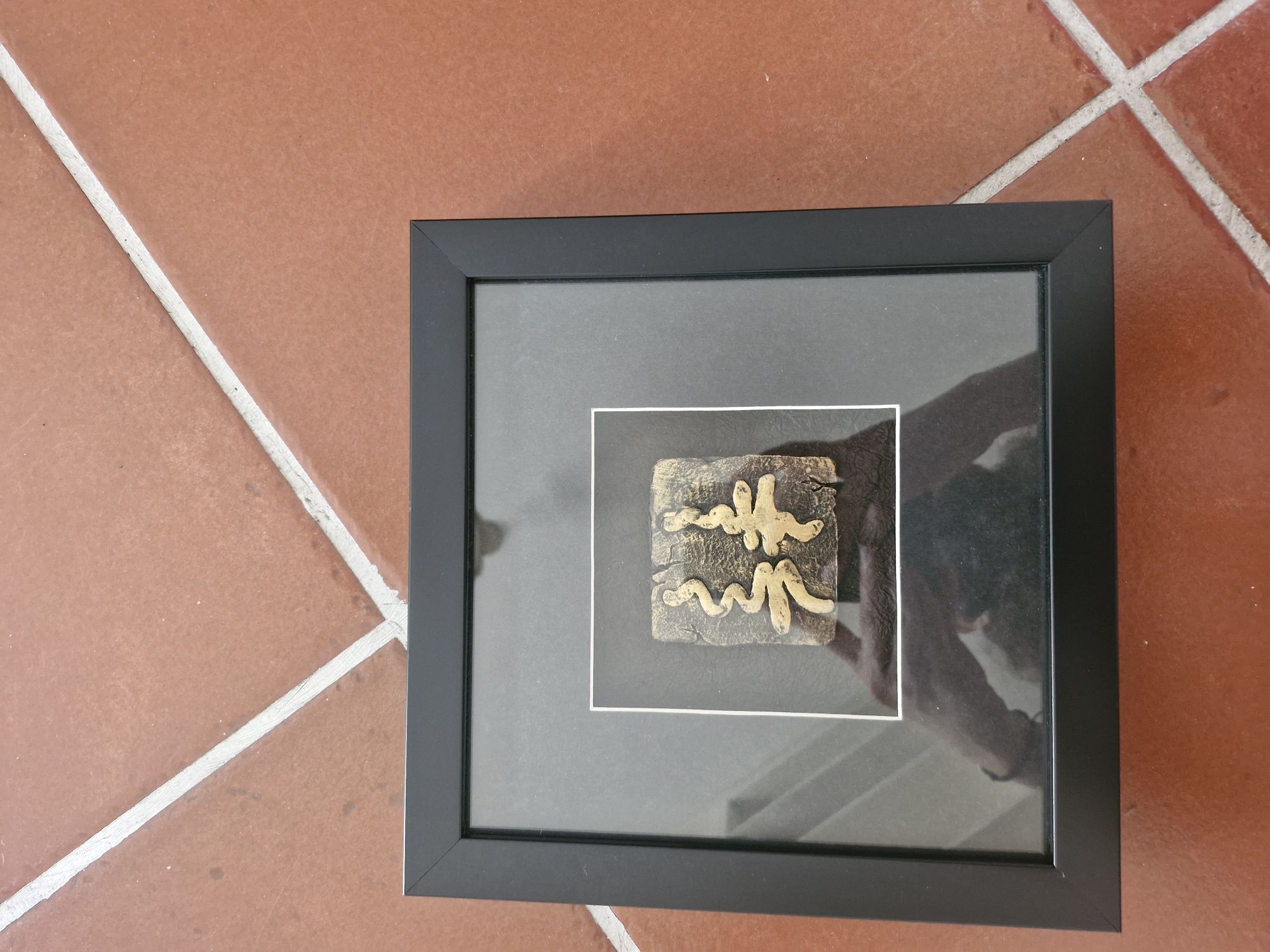 Quadro com caracteres orientais