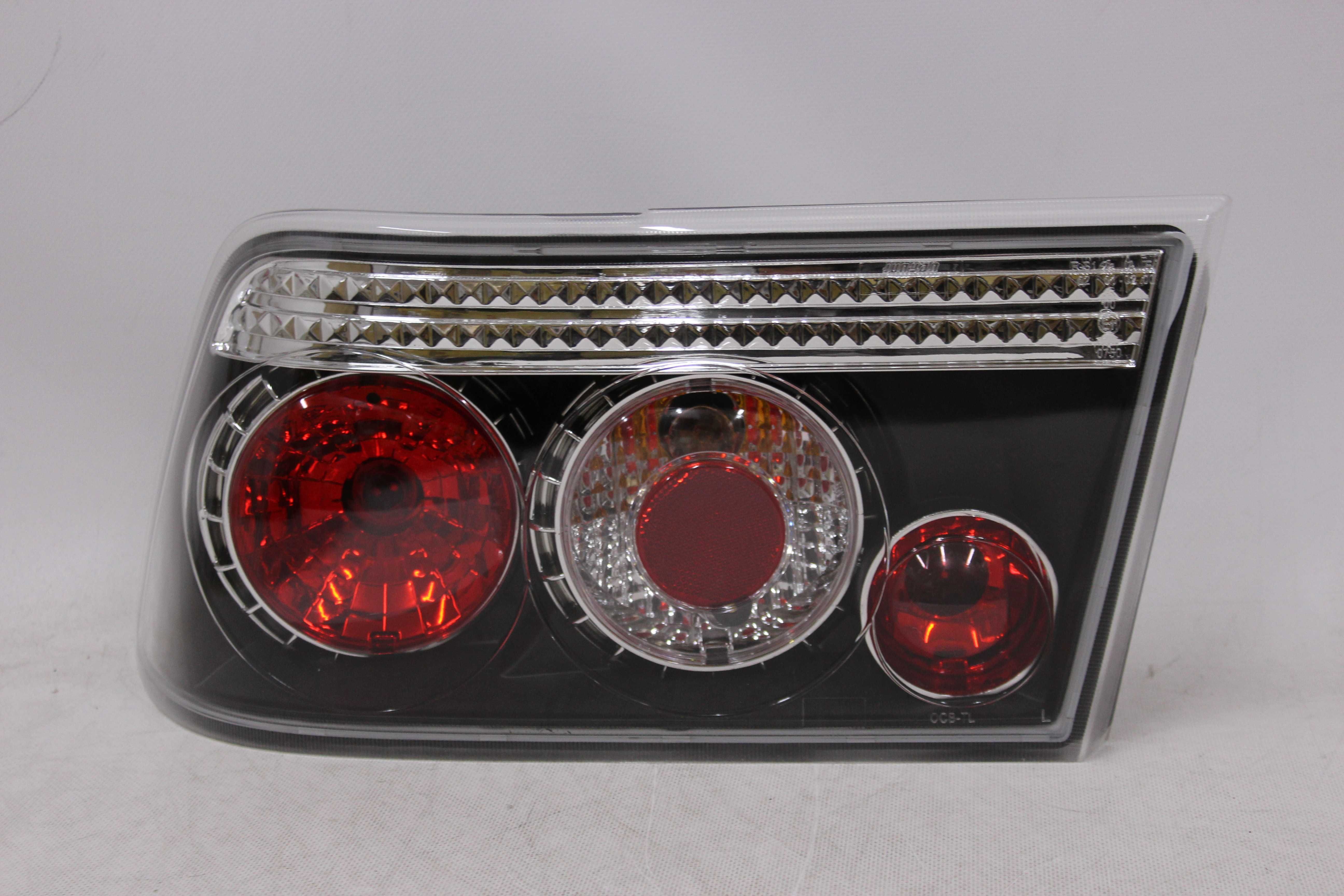 Lampy światła tył tylne OPEL CALIBRA 90-97 BLACK Czarne Smoke NOWE