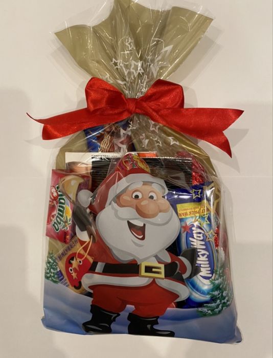 Paczki na święta dla dzieci na Mikołaja ze słodyczami