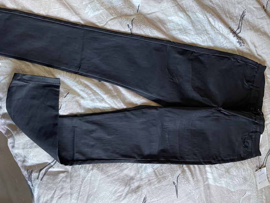 Nowe woskowane spodnie mohito skinny 42