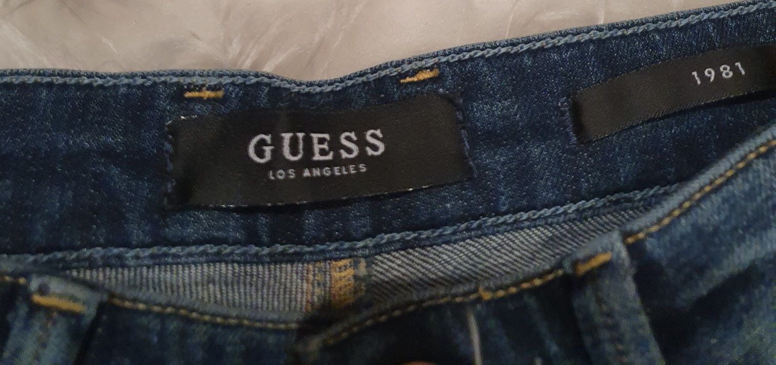 Super spodnie jeansowe Guess.