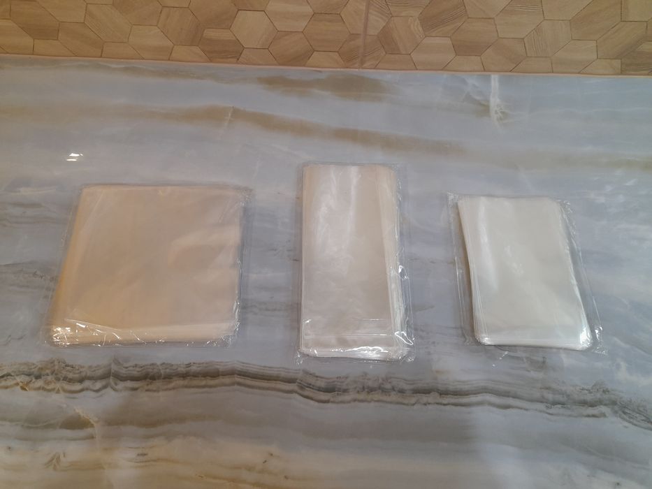 Універсальні поліпропіленові пакети/атласна стрічка