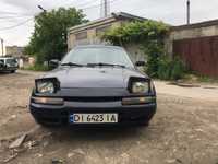 Mazda 323   f bg