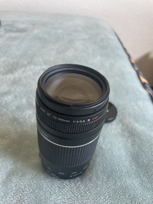 Vendo lente canom 75/300 nova pouco tempo de uso