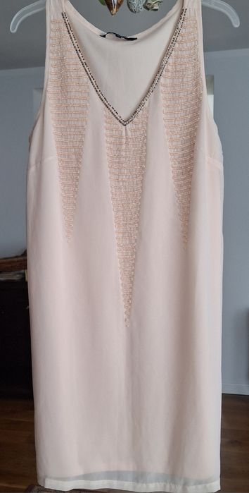 Różowa sukienka na podszewce Reserved