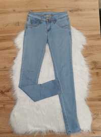 Spodnie damskie jeansowe r. XS 75 % Bawełna