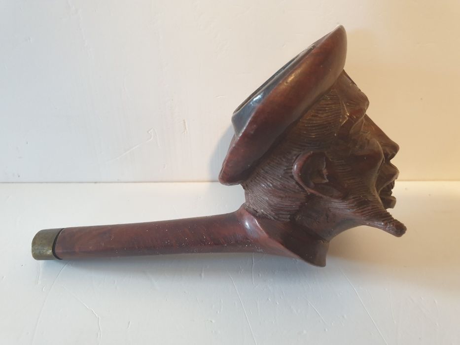 Antiga cabeça de um cachimbo americano -Farmers head