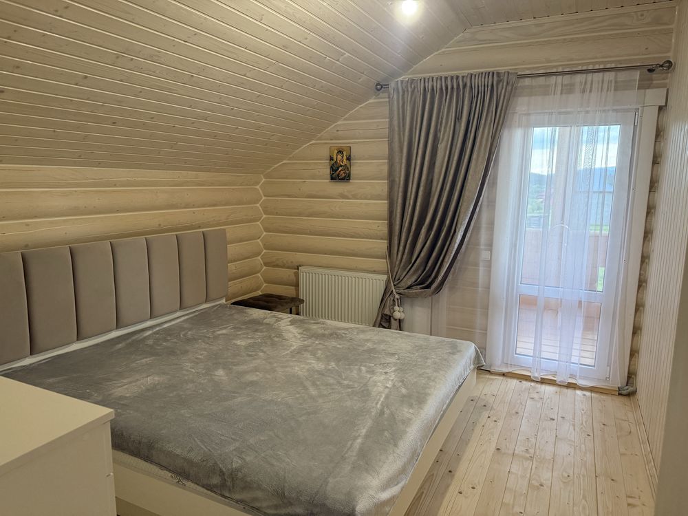 Еко- будинок з бруса серед Карпатських гір