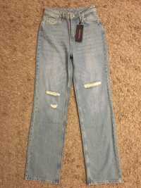 Nowe jeansy z rozdarciami XS