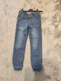 Spodnie jeansowe ocieplane Sinsay rozm 140, nowe bez metki