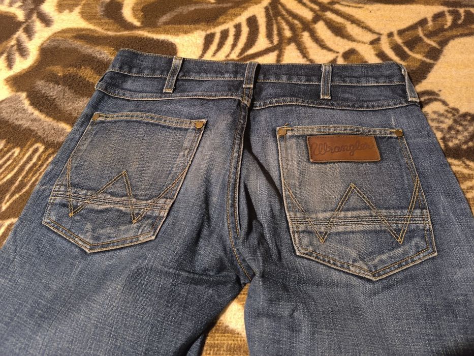 Spodnie jeansowe męskie granatowe Wrangler ACE  W32 L34