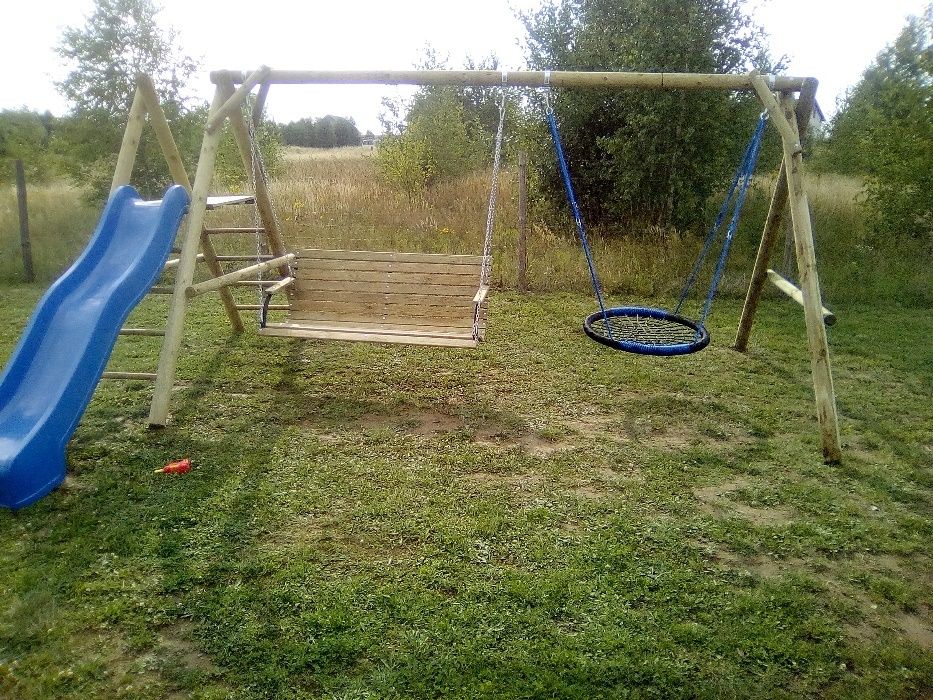 plac zabaw zjeżdzalnia,hustawka,bocianie gniazdo