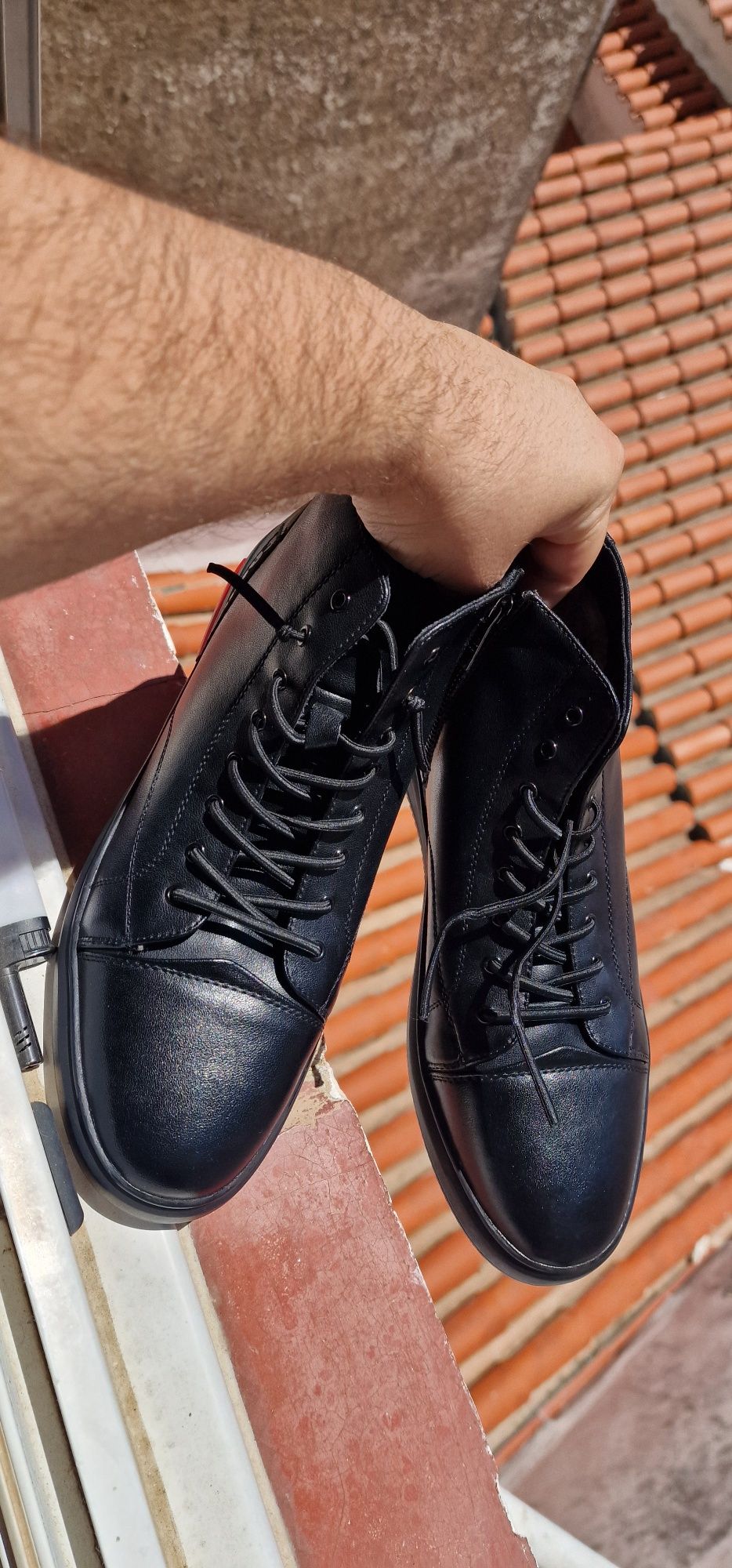 Botas em pele - pretas