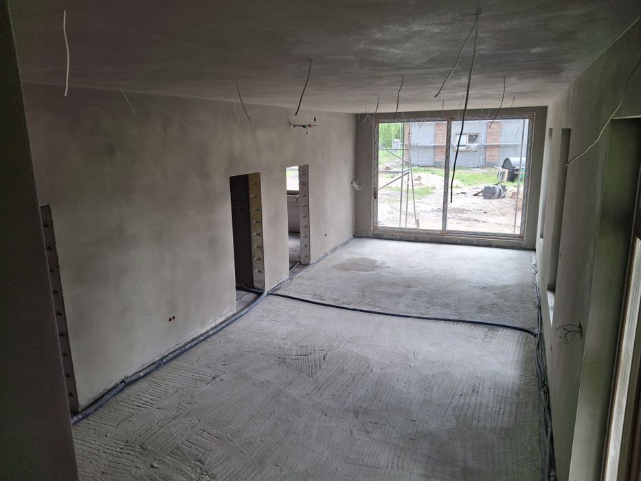 Tynki maszynowe cementowo wapienne