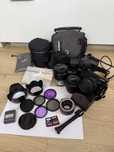 Aparat fotograficzny Panasonic Lumix z 3 obiektywami i akcesoriami