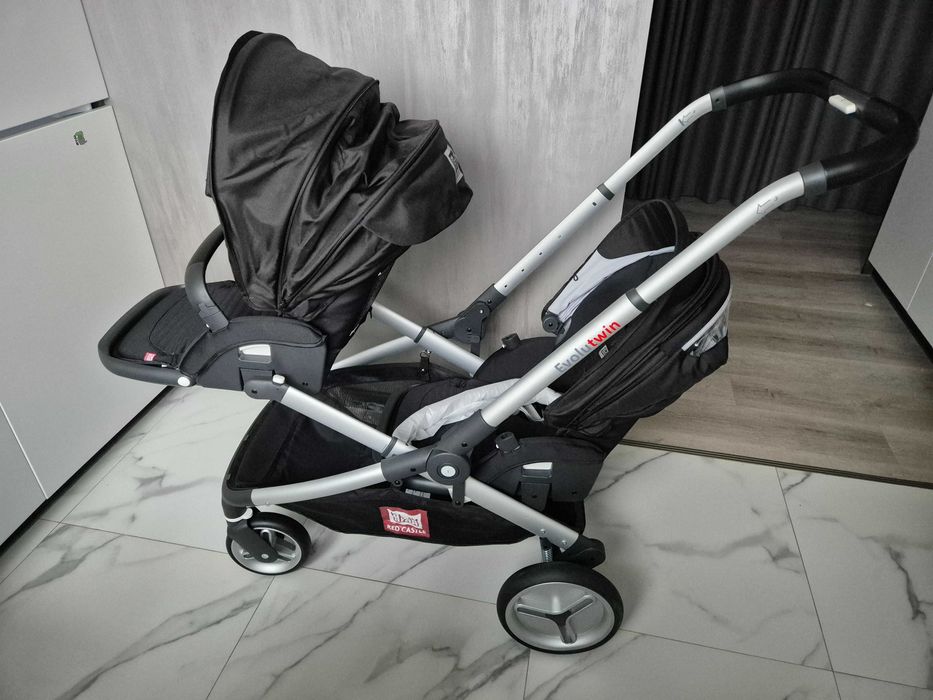 Універсальна коляска Red Castle Evolutwin для двійні